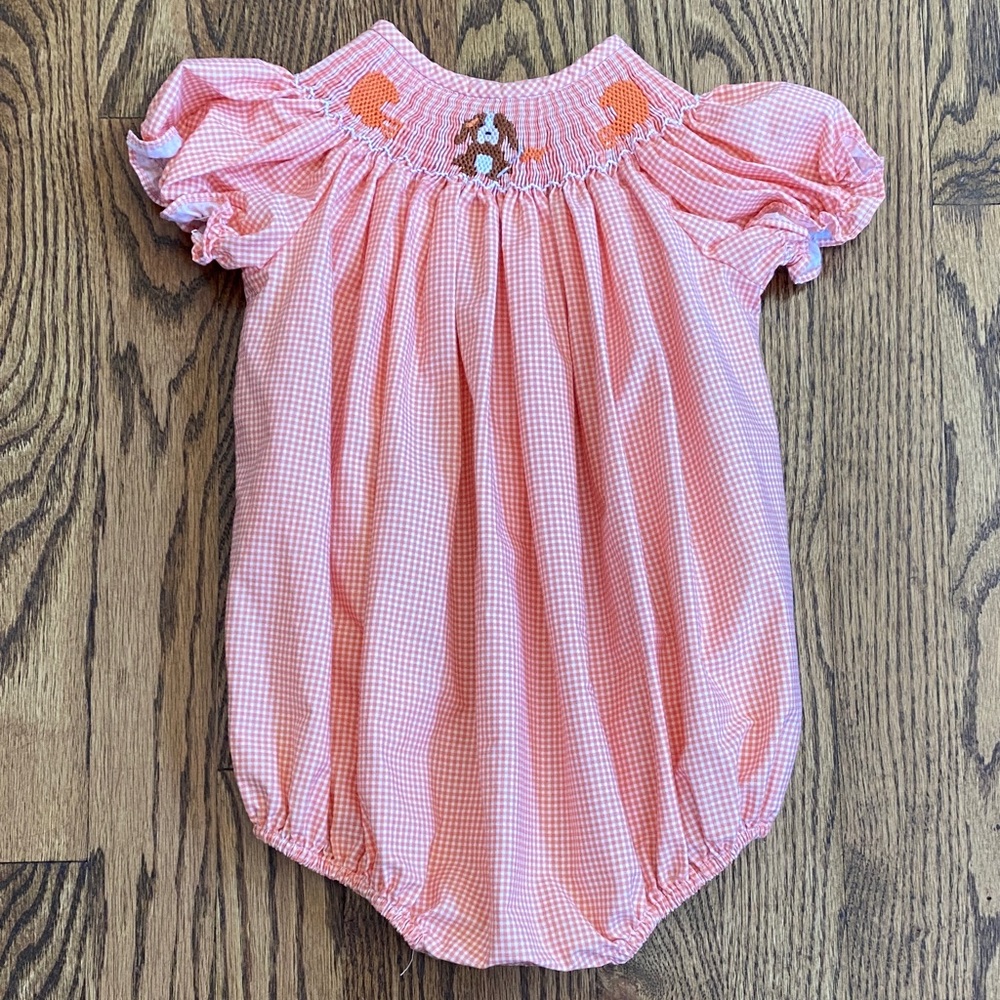 Charming Little One boutique puppy& football smocked bubble, size 9 months.